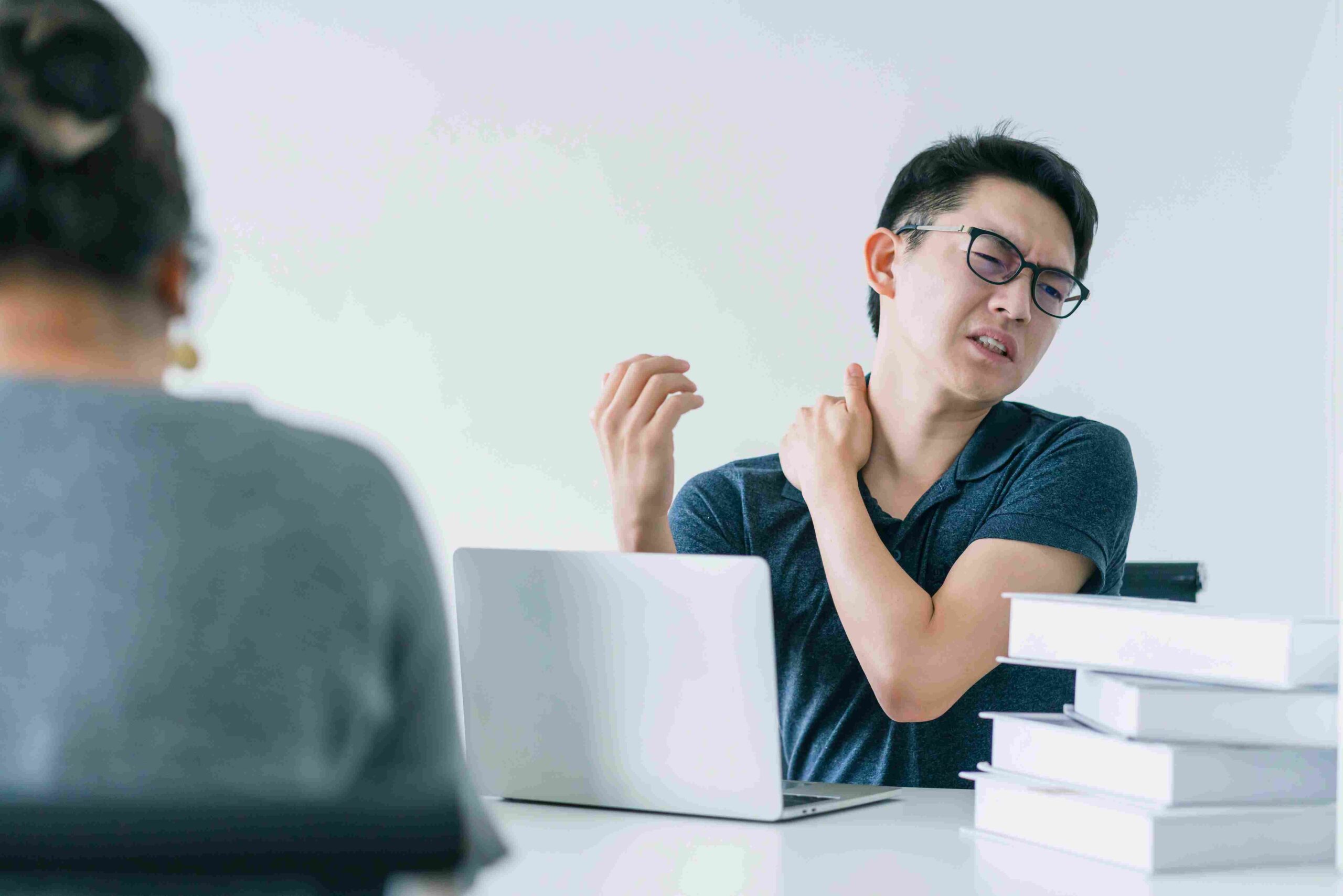 Asian working hard man with office syndrome have problem with part body arm shoulder head neck back healthy problem ideas concept 11zon scaled